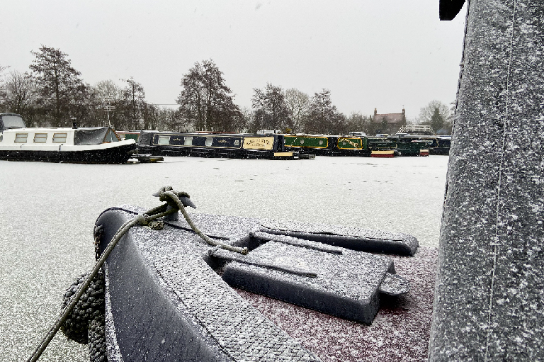 Narrowboat Prow in Snow image